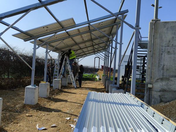 Fixing the panels on the elevated structure