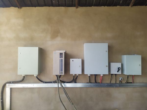 Pump drive and protection boxes on the wall