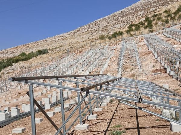 Frames on concrete footings across the slope
