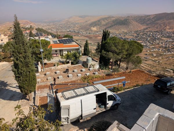 The site on the hillside during installation