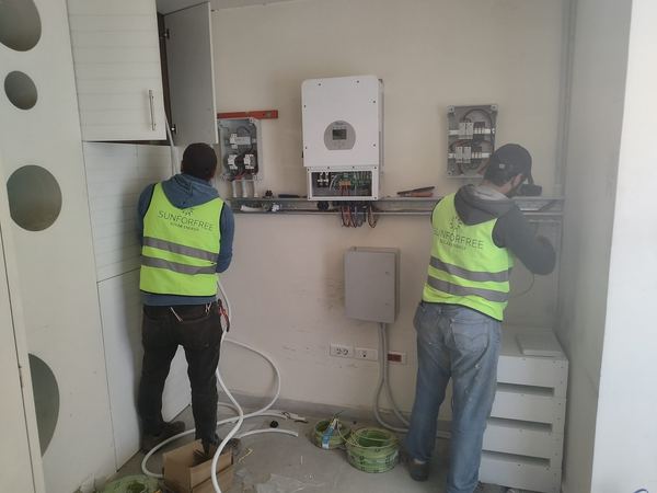 Our team wiring the inverter