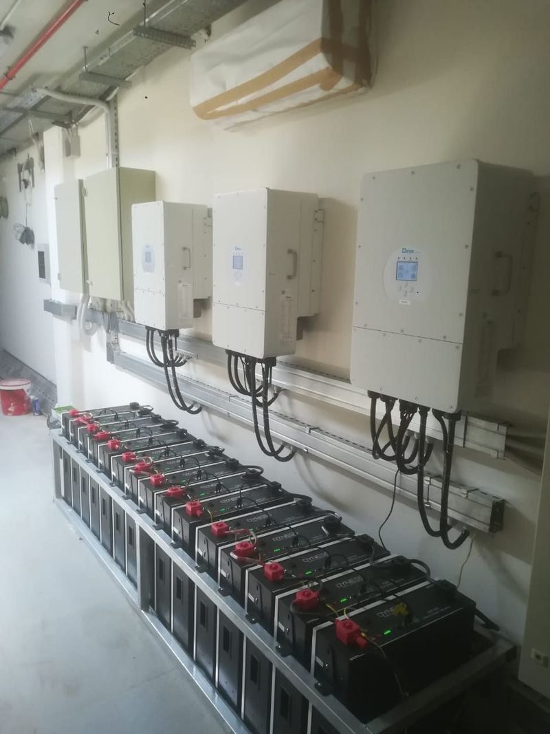 Three hybrid inverters and the battery rack