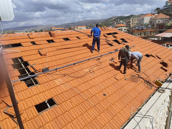 Fixing rails on the tiled roof
