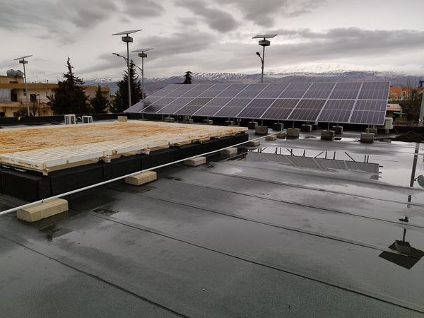 Rooftop rows beside solar street lights